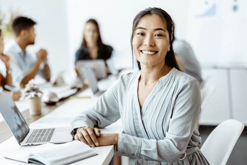 Female professional in workplace during a business meeting