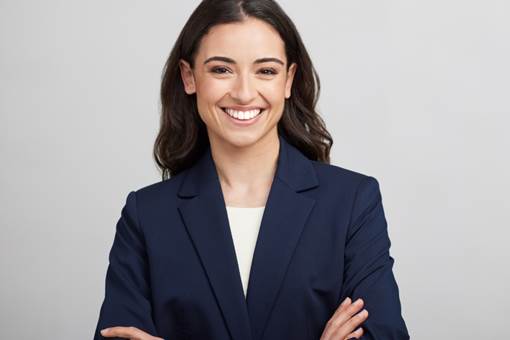 Female professional smiles confidently
